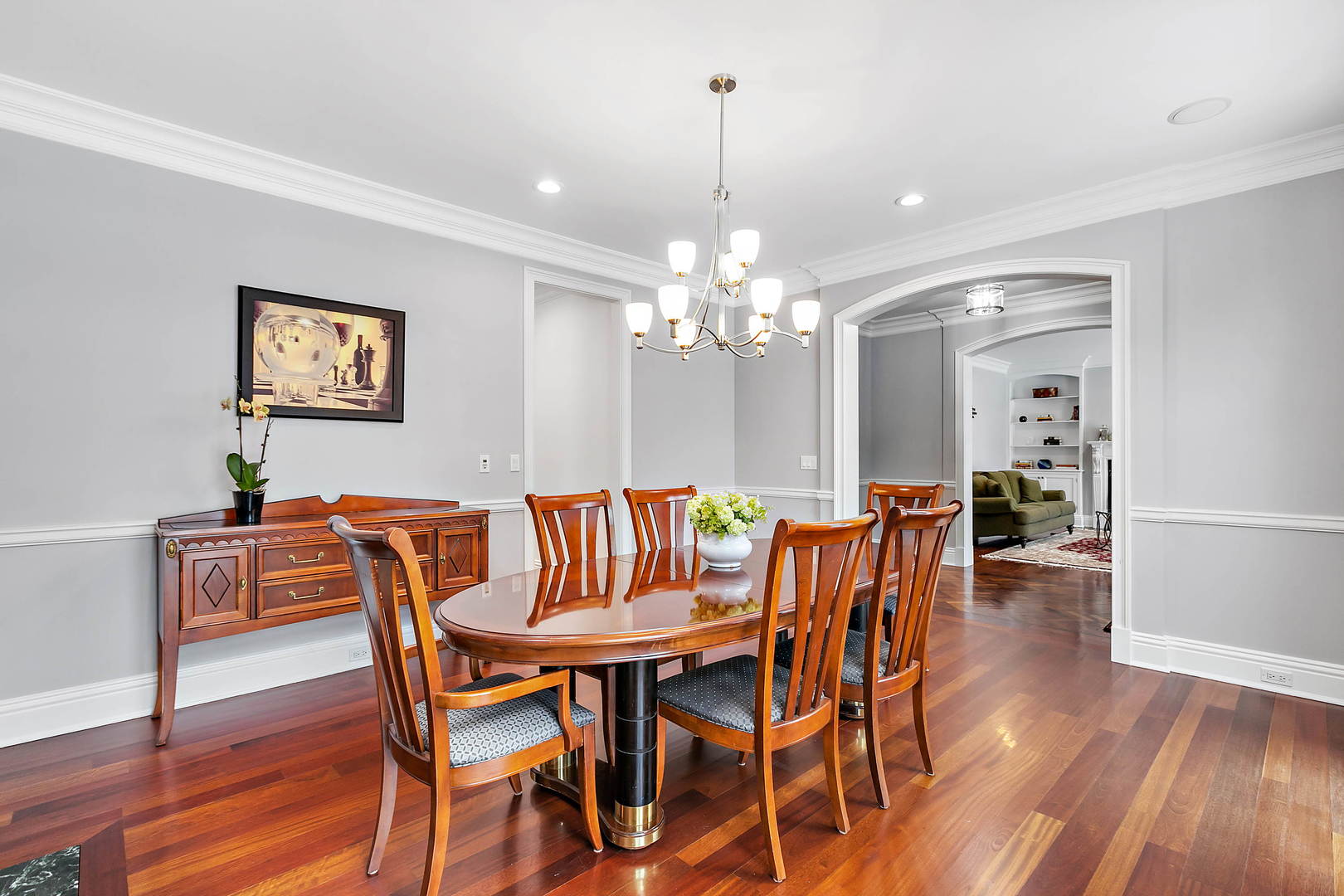 594 Willow Road Winnetka, IL 60093 - Photo 15 of 41 a view of a dining room with furniture wooden floor and chandelier