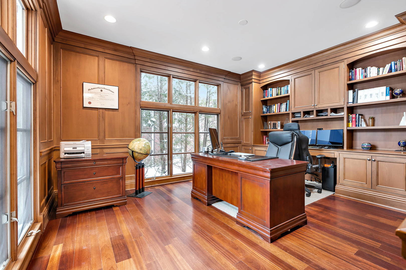 594 Willow Road Winnetka, IL 60093 - Photo 16 of 41 a room with furniture windows and wooden floor