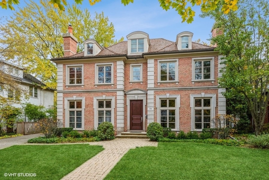594 Willow Road Winnetka, IL 60093 - Photo 2 of 41 front view of a house with a yard