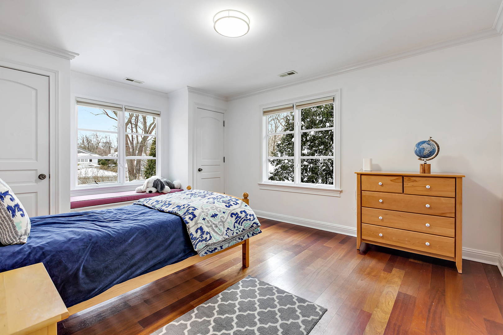 594 Willow Road Winnetka, IL 60093 - Photo 24 of 41 a bedroom with a bed and a window