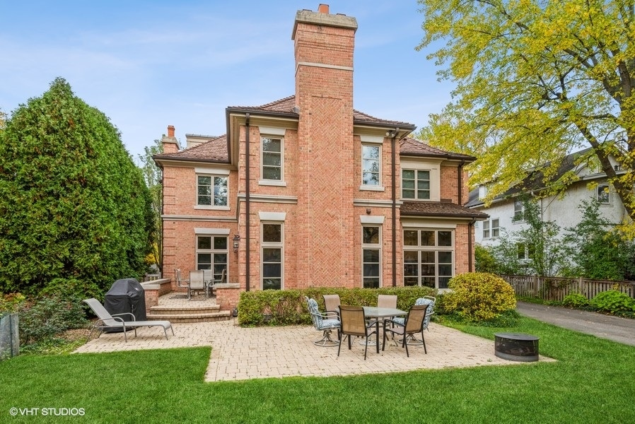 594 Willow Road Winnetka, IL 60093 - Photo 31 of 41 a front view of a house with a yard