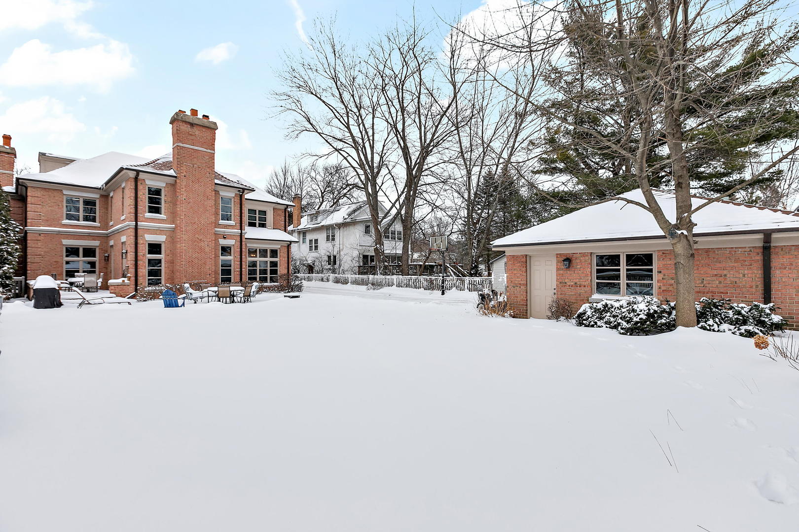594 Willow Road Winnetka, IL 60093 - Photo 35 of 41 a front view of a house with a yard