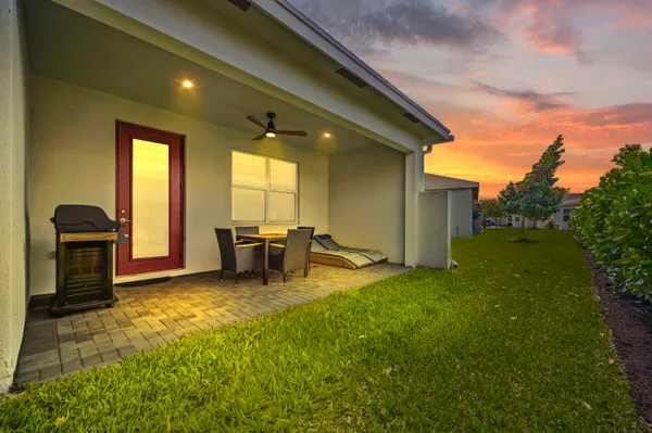 a view of a livingroom with furniture and a yard