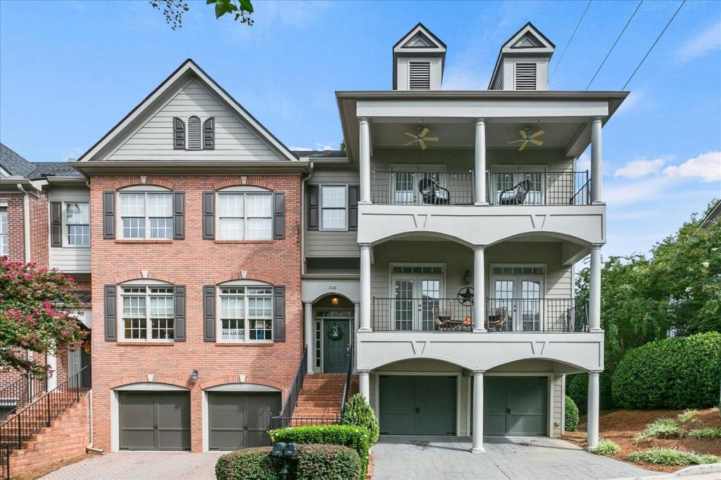 226 Meeting Lane Sandy Springs, GA 30342 - Photo 1 of 1 a front view of a house with a yard