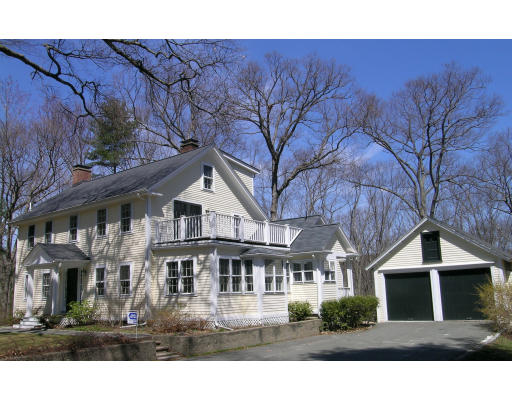 108 Lincoln Road Lincoln, MA 01773 - Photo 1 of 8 a front view of residential houses with yard and trees