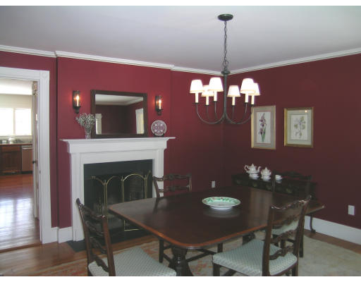 108 Lincoln Road Lincoln, MA 01773 - Photo 4 of 8 a living room with furniture a fireplace and a chandelier