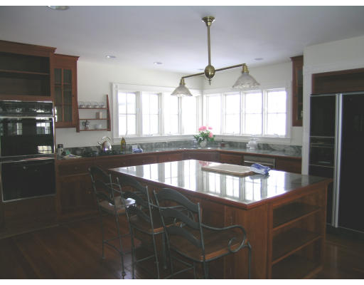 108 Lincoln Road Lincoln, MA 01773 - Photo 5 of 8 a kitchen with lots of counter top space and a window