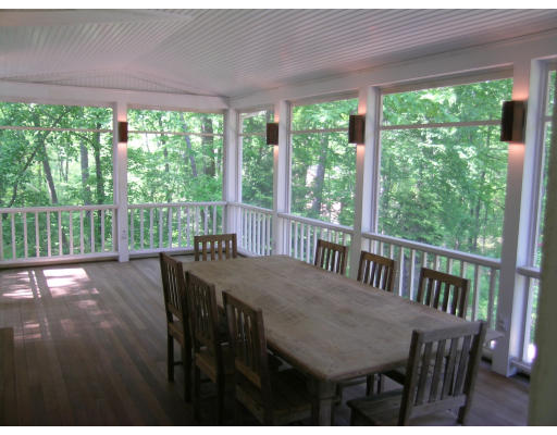 108 Lincoln Road Lincoln, MA 01773 - Photo 8 of 8 a view of a dining room with furniture window and outside view