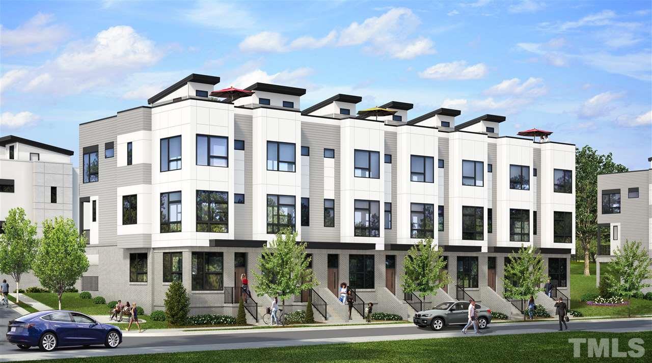 518 North Roxboro Street Durham, NC 27701 - Photo 2 of 20 a front view of a building with lot of cars and trees