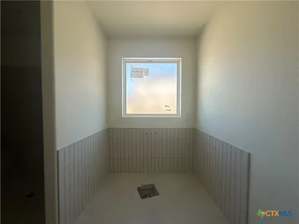 a bathroom with a window