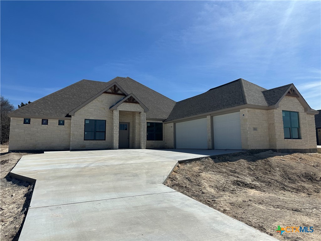 7063 Troyan Lane Temple, TX 76502 - Photo 3 of 28 a front view of a house with a yard