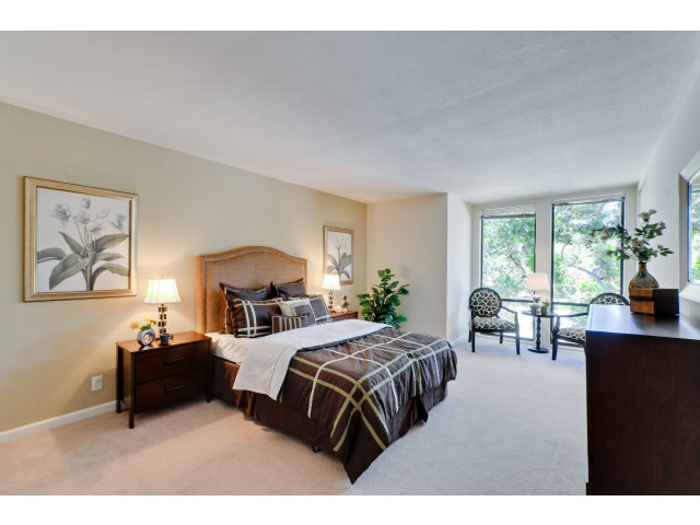 1111 Compass Lane, Unit 204 Foster City, CA 94404 - Photo 7 of 13 a bedroom with a bed and a large window