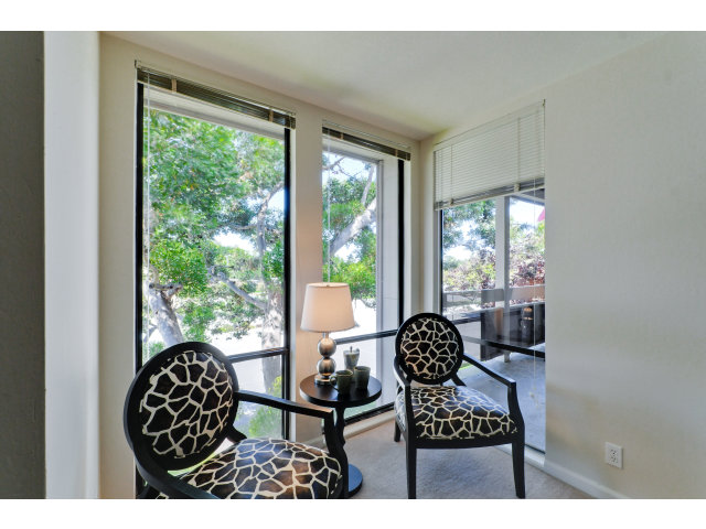 1111 Compass Lane, Unit 204 Foster City, CA 94404 - Photo 10 of 13 a living room with furniture and a large window