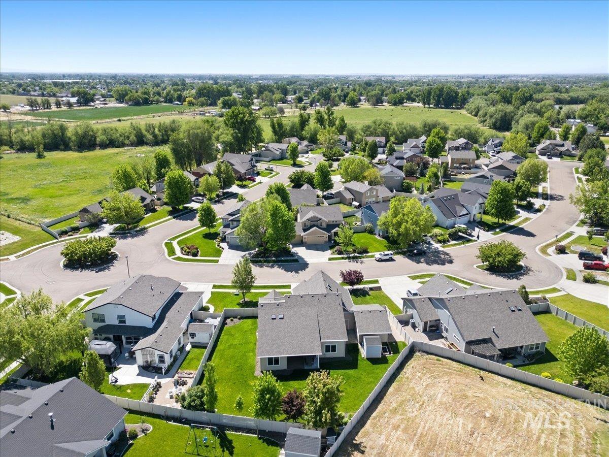 1183 North Buffalo Way Middleton, ID 83644 - Photo 46 of 47 Aerial view of a residential neighborhood featuring cul-de-sac streets, mature landscaping, and green spaces