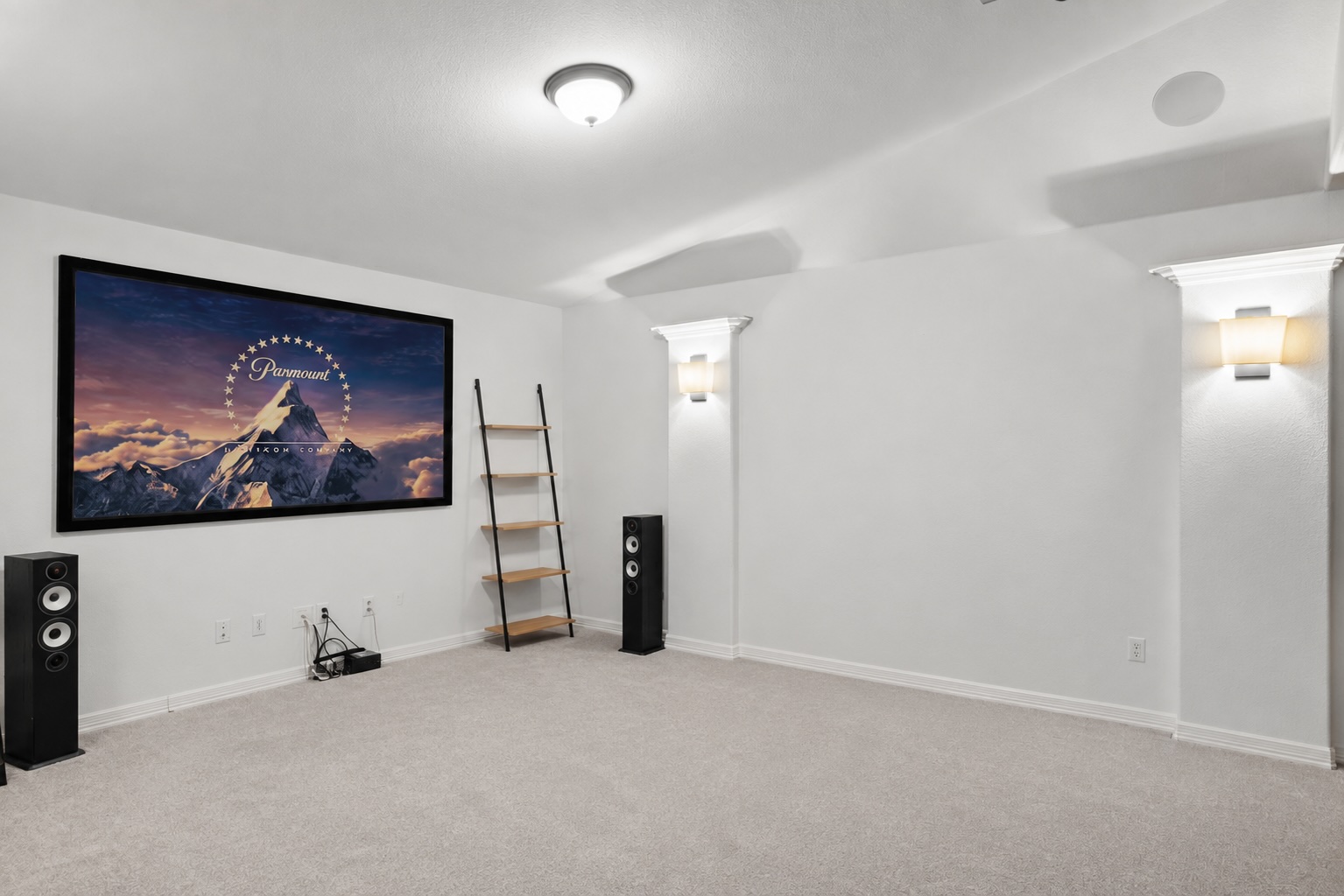 8801 Wild Rice Cove Austin, TX 78738 - Photo 29 of 40 Upstairs dedicated media room with built-ins