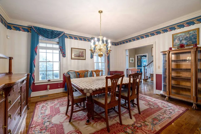 a living room with furniture flat screen tv and a fireplace