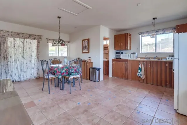 a view of a livingroom with furniture and window