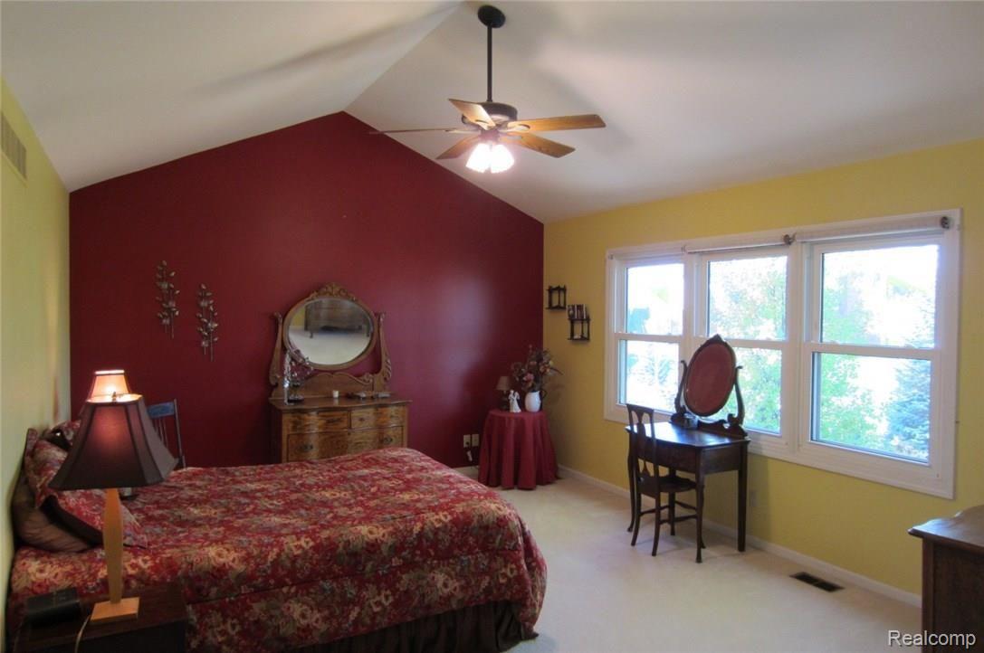 3968 May Center Road Lake Orion, MI 48360 - Photo 11 of 24 Wonderful Master Bedroom has vaulted ceiling & walk in closet. Overlooks rear yard.