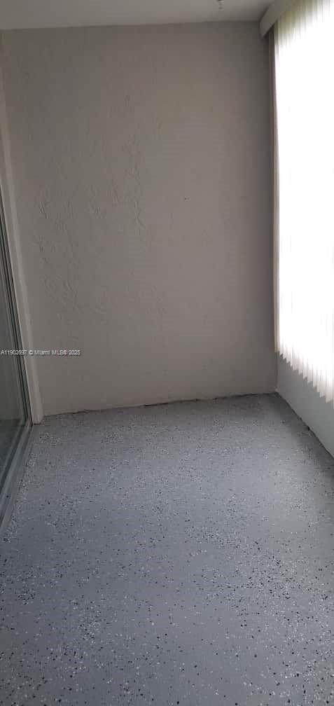 8331 Sands Point Boulevard, Unit C205 Tamarac, FL 33321 - Photo 14 of 25 a view of an empty room