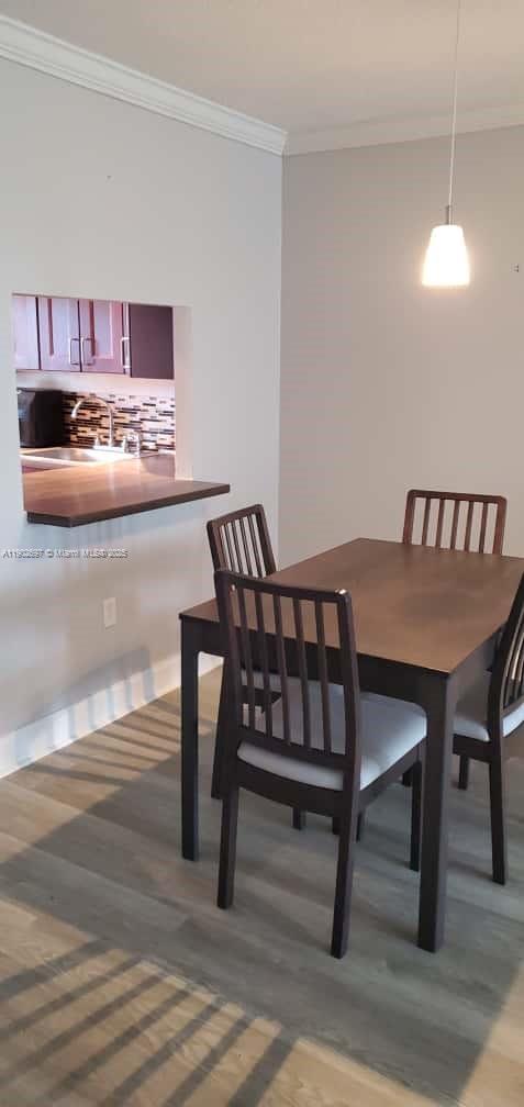 8331 Sands Point Boulevard, Unit C205 Tamarac, FL 33321 - Photo 5 of 25 a view of a dining room with furniture