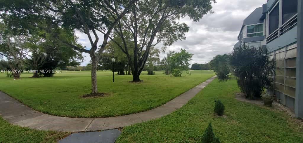 8331 Sands Point Boulevard, Unit C205 Tamarac, FL 33321 - Photo 10 of 25 a view of a park