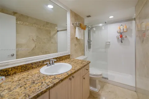 a view of a hallway with a white walls