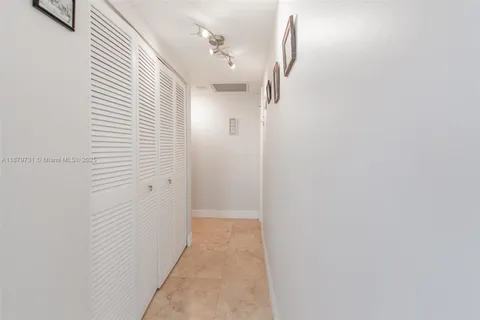 a view of a balcony with furniture