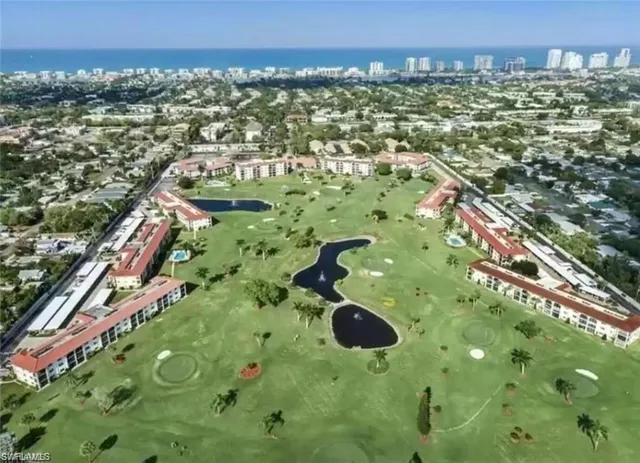 $410,000 | 5 High Point Circle West, Unit 212, Naples, FL 34103