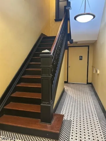 a view of entryway with a front door