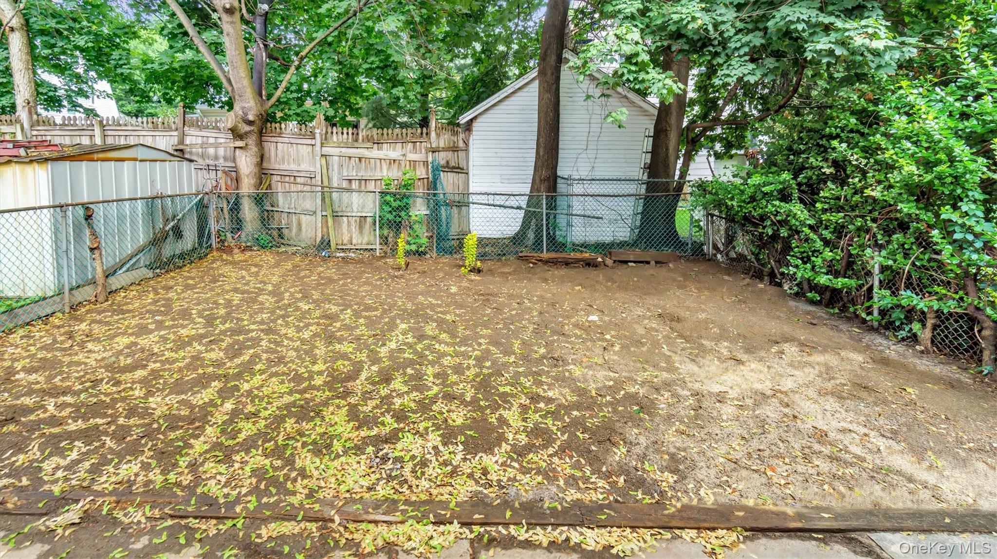 3 Walnut Place Great Neck, NY 11021 - Photo 30 of 34 View of fenced backyard