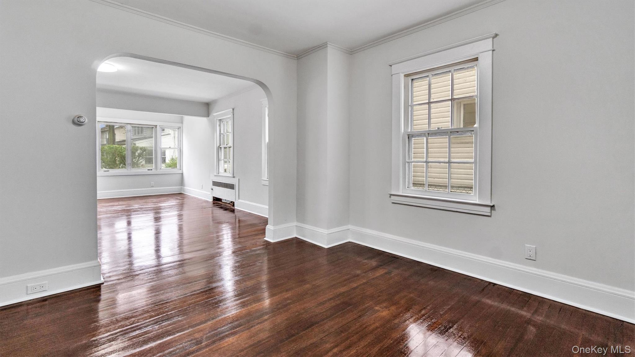 3 Walnut Place Great Neck, NY 11021 - Photo 7 of 34 Unfurnished room Abundant light,hardwood floors and crown molding