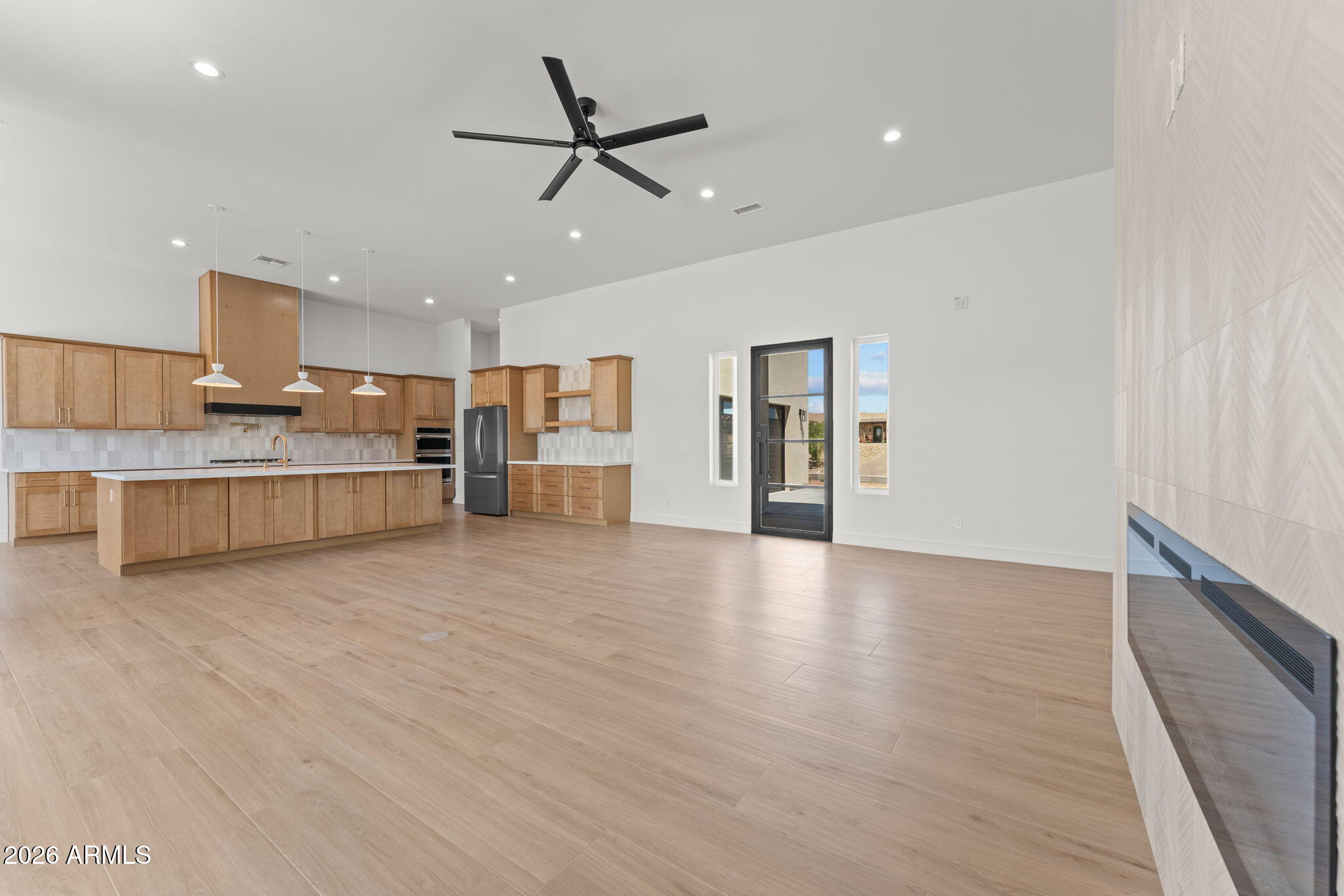 2855 Percheron Road Wickenburg, AZ 85390 - Photo 17 of 58 a view of a kitchen with a sink and a refrigerator