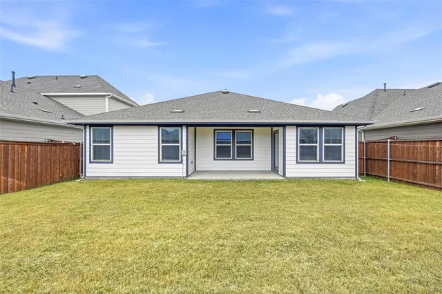 a house view with a garden space