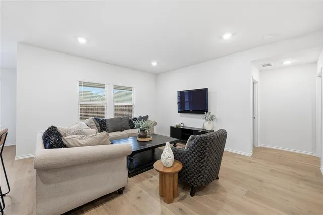 a kitchen with a stove a refrigerator and a refrigerator