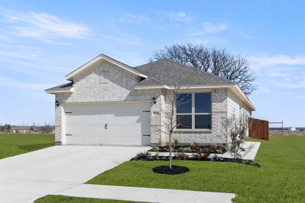 8224 Kingfisher Road Pilot Point, TX 76258 - Photo 2 of 27 a front view of house with yard and green space