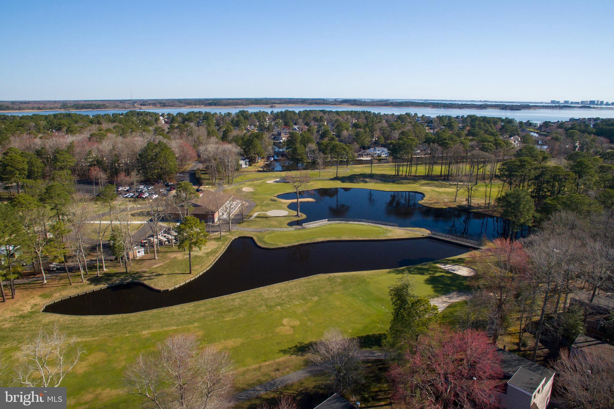 69 Windjammer Road Ocean Pines, MD 21811 - Photo 48 of 53 a view of a swimming pool with an ocean view