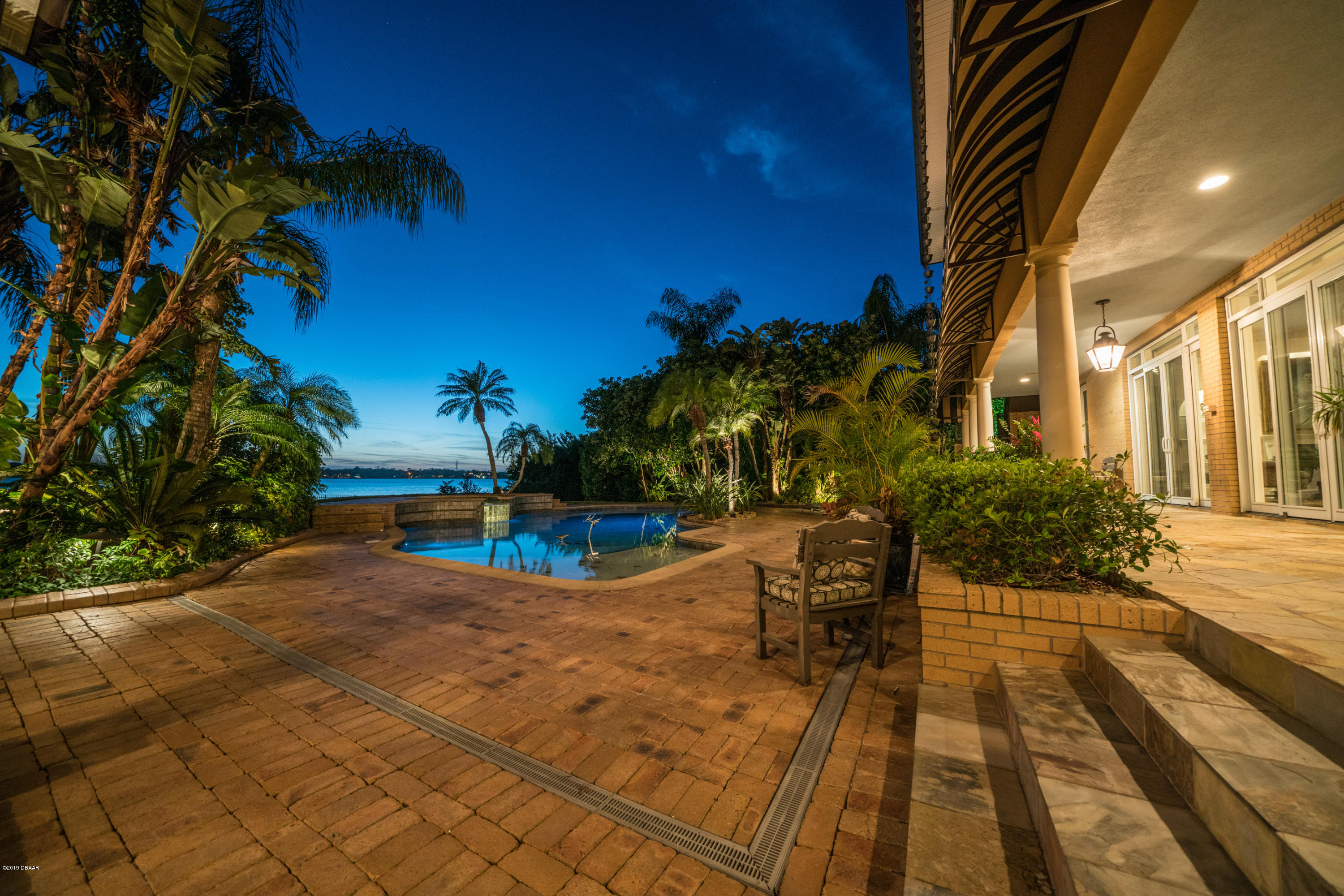 300 Riverside Drive Ormond Beach, FL 32176 - Photo 28 of 72 a view of a swimming pool with a patio