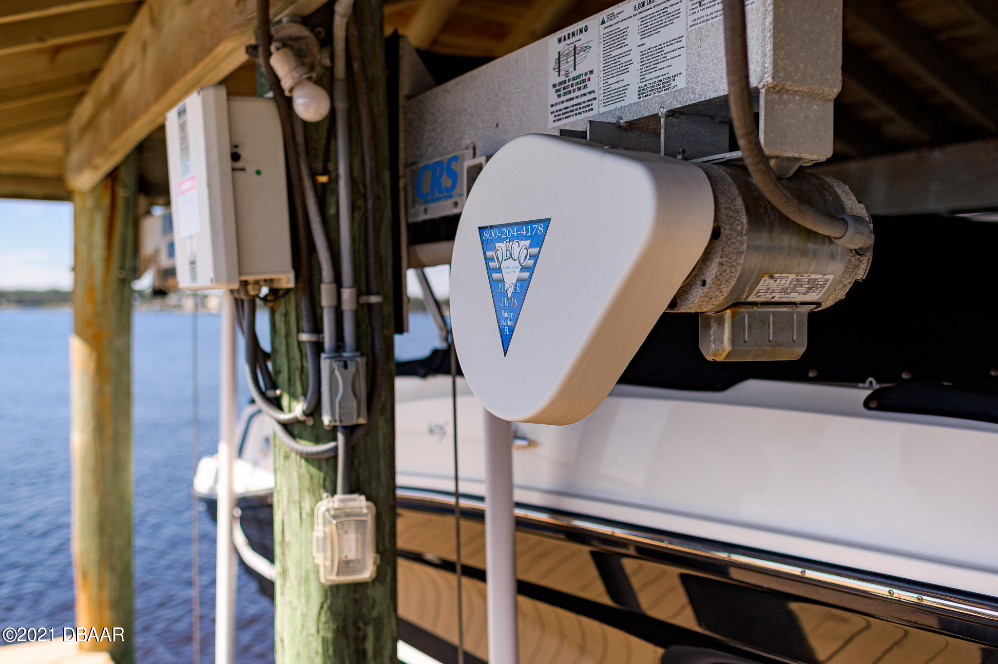 300 Riverside Drive Ormond Beach, FL 32176 - Photo 48 of 72 a view of walk in closet with clothes and shoes