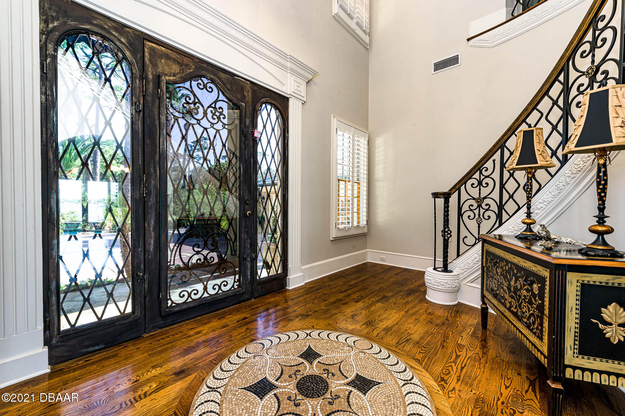 300 Riverside Drive Ormond Beach, FL 32176 - Photo 5 of 72 a view of an entryway with wooden floor