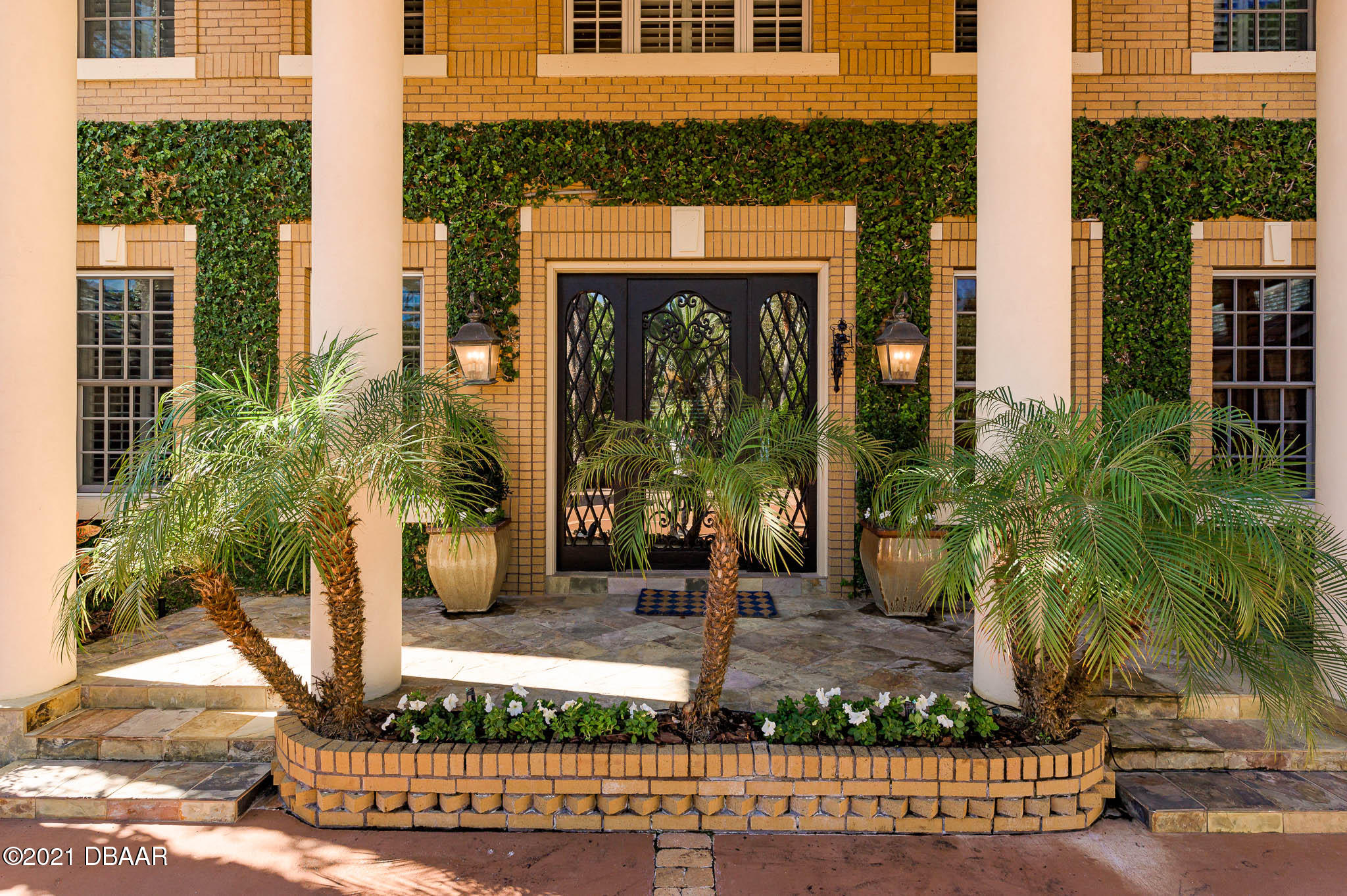 300 Riverside Drive Ormond Beach, FL 32176 - Photo 62 of 72 a front view of a house with garden