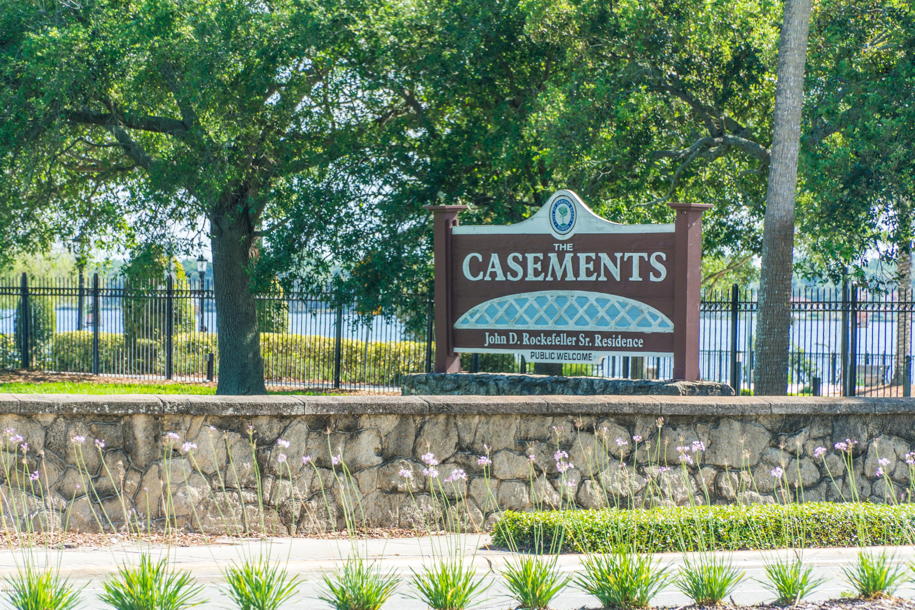 300 Riverside Drive Ormond Beach, FL 32176 - Photo 66 of 72 a sign on the side of a road