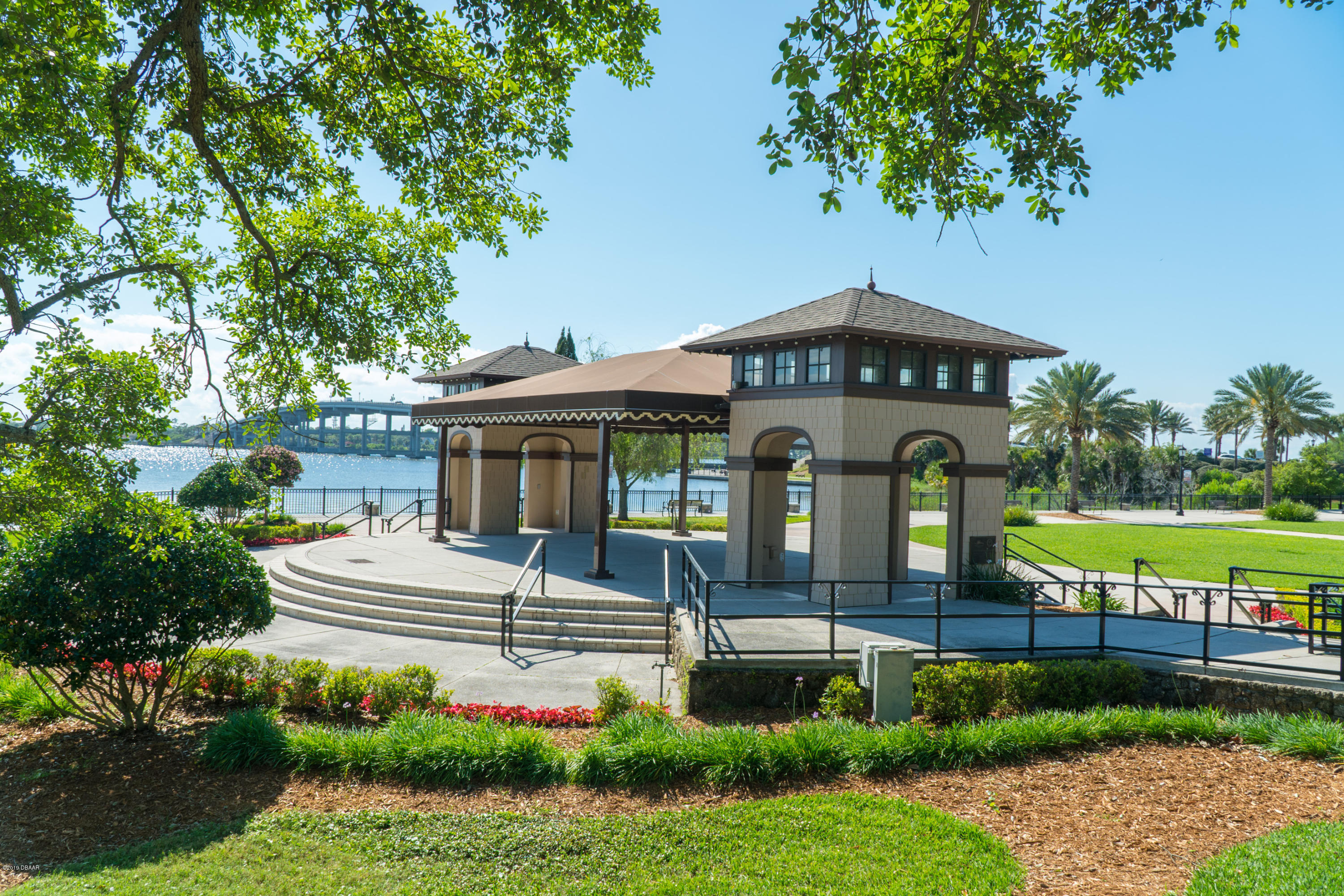 300 Riverside Drive Ormond Beach, FL 32176 - Photo 68 of 72 a front view of a house with garden