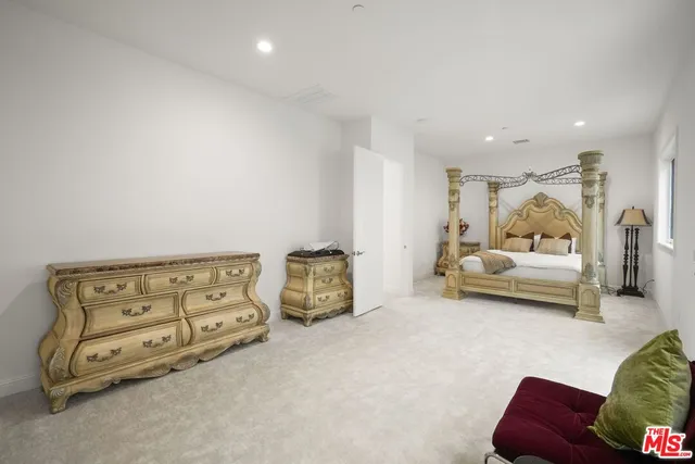 a bedroom with furniture and a couch