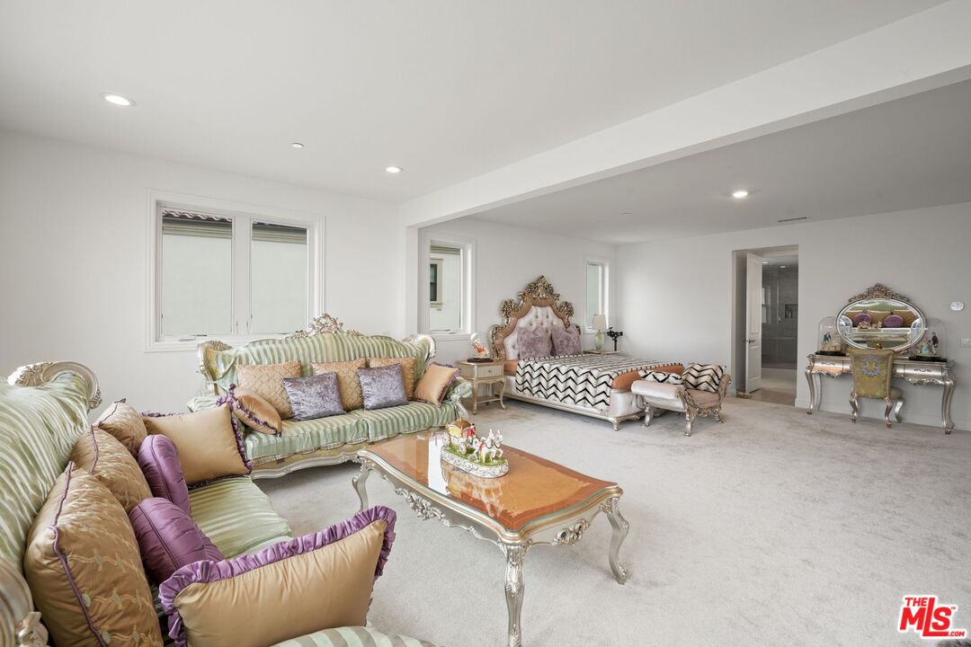 20244 Albion Way Porter Ranch, CA 91326 - Photo 22 of 47 a living room with furniture and a couch
