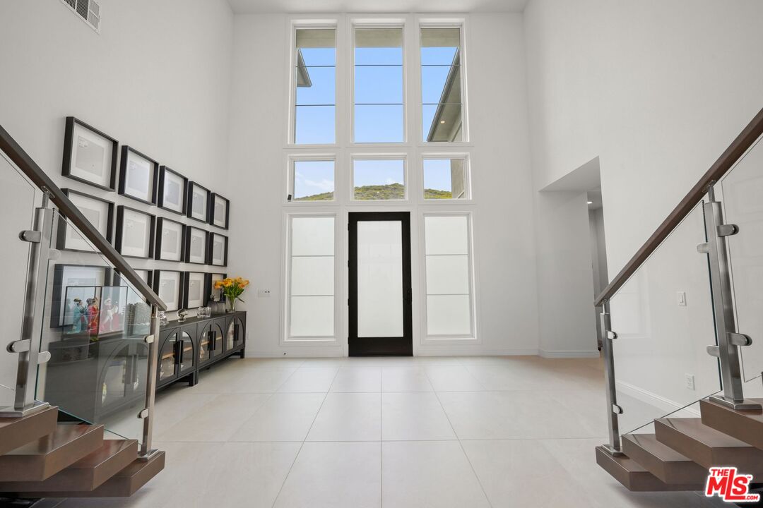 20244 Albion Way Porter Ranch, CA 91326 - Photo 4 of 47 a view of an entryway with workspace