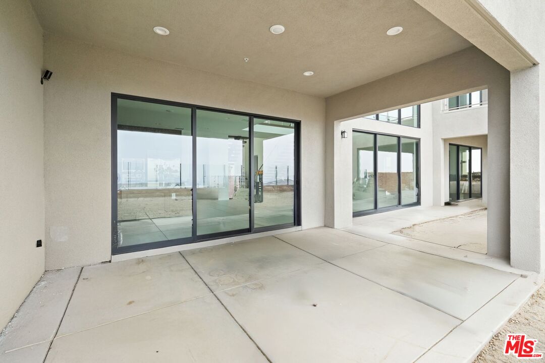 20244 Albion Way Porter Ranch, CA 91326 - Photo 44 of 47 a view of an empty room with glass door