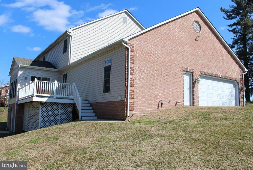 2101 Laurel Brook Road Fallston, MD 21047 - Photo 3 of 28 a front view of a house with a yard