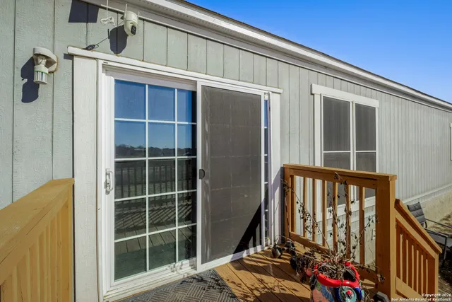 a house view with a backyard space