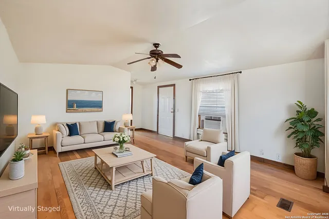 a kitchen with stainless steel appliances a stove a refrigerator and cabinets
