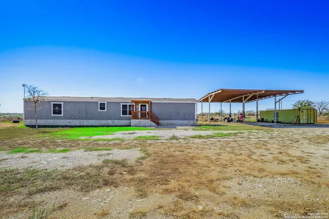a outdoor view with a seating space